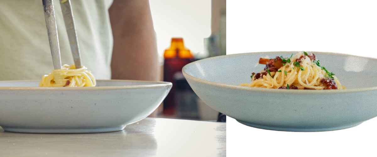 Impiattamento di spaghetti alla carbonara cremosa infusa alla cannabis con pancetta e formaggio grattugiato, ultimo passo prima di servire